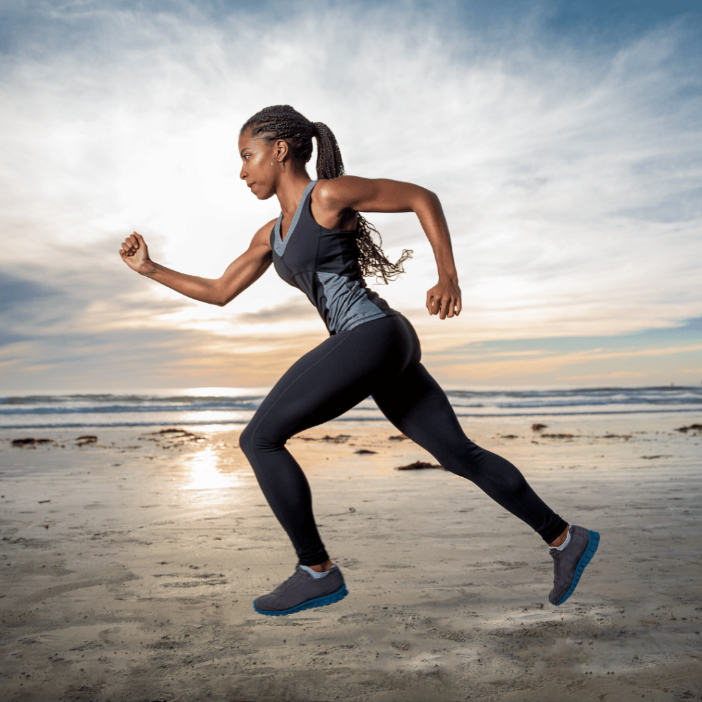 fast runner lady on a beach when you run